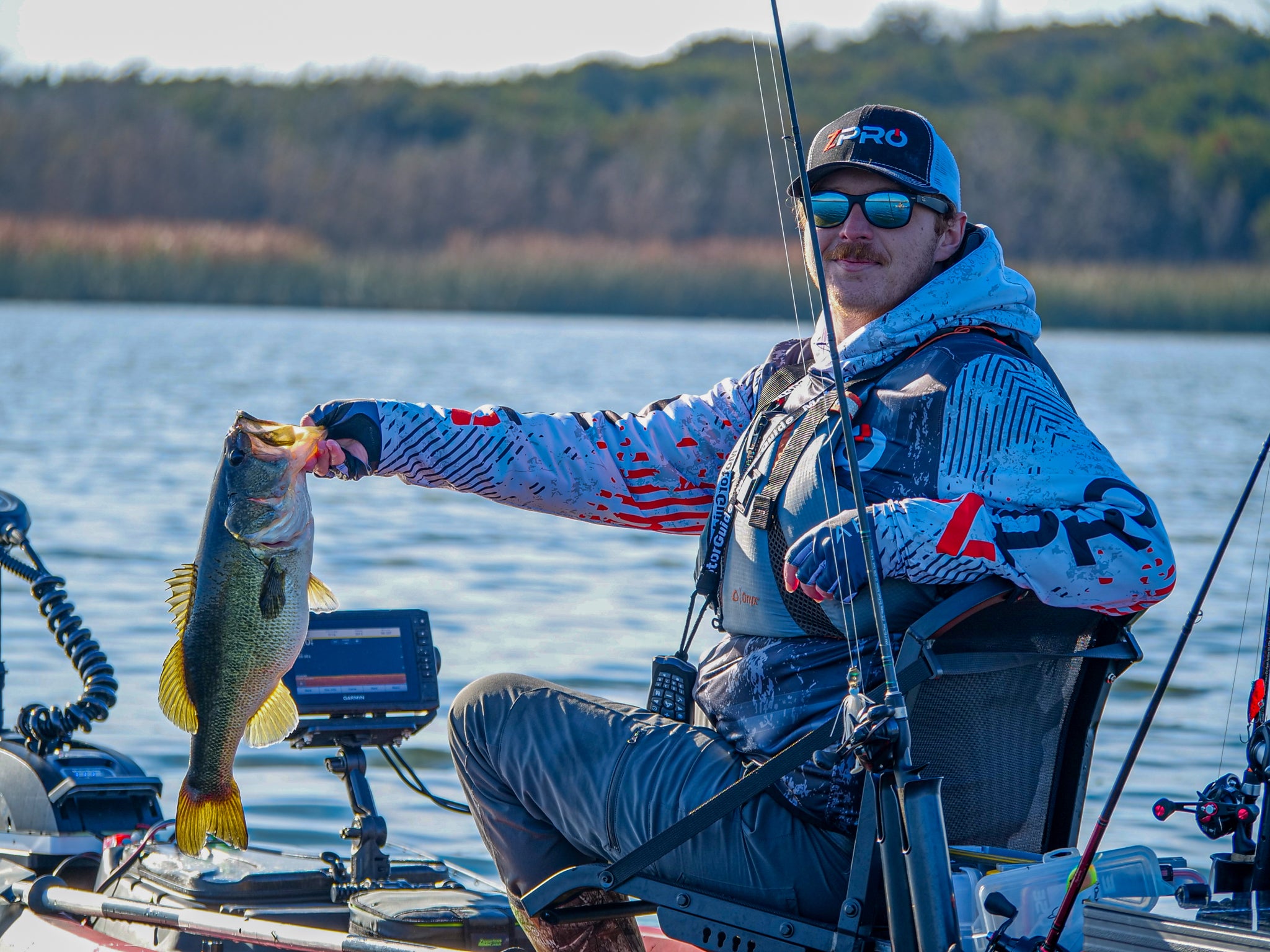 holding fish in kayak